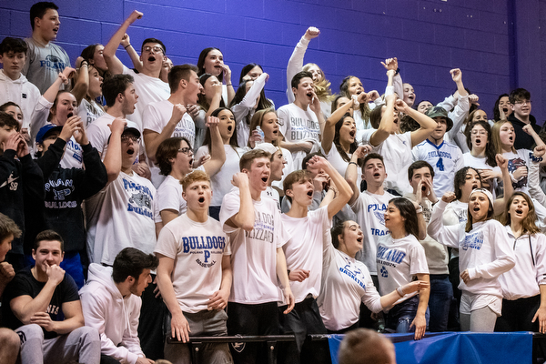 DIANNA OATRIDGE | THE VINDICATOR  The Poland student section cheers on the Lady Bulldogs during the Division II Regional Semi final in Barberton on Tuesday.