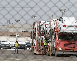  ROBERT K.YOSAY  | THE VINDICATOR..GM Lordstown finished the last Cruze at the plant Wed Afternoon. Putting thousands out of work ..A load of Cruze's  are checked before heading out of the  plant