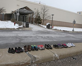  ROBERT K.YOSAY  | THE VINDICATOR..GM Lordstown finished the last Cruze at the plant Wed Afternoon. Putting thousands out of work ..some workers left their work shoes on the curb as they exited the plant