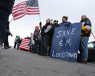  ROBERT K.YOSAY  | THE VINDICATOR..GM Lordstown finished the last Cruze at the plant Wed Afternoon. Putting thousands out of work ..workers protested and  block Bailey road with signs and flags