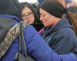 William D. Lewis the vindictor   Heidi Garren,right and a 24 year gm lordstown employee of Jefferson County  is comforted by fellow workers during a rally 3-6-19 outside the plant.