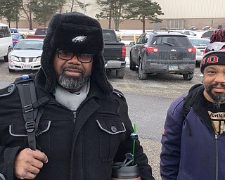 Left to right, Tommie Harris and simeon Felder, both of Youngstown, two GM workers leaving after their final day of working on the Cruze.