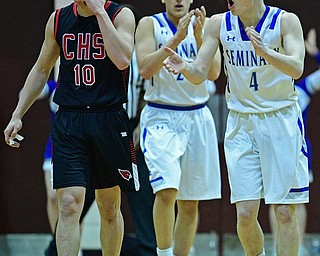 BOARDMAN, OHIO - MARCH 6, 2019: Poland's Jeff McAuley claps after Canfield's Conor Crogan turned the ball over during the first half of their OHSAA Tournament game, Wednesday night at Boardman High School. DAVID DERMER | THE VINDICATOR