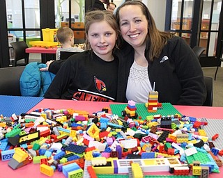 Neighbors | Abby Slanker.Katelyn Rakers and her mom, Colleen, attended Lego my Library at the Canfield library on Feb. 2.