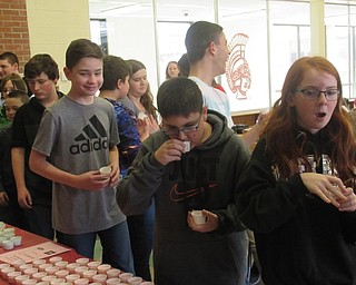 Neighbors | Jessica Harker .Students at Boardman Glenwood Junior High School voted for their favorite of three flavors of milk, including cotton candy, strawberry and cookies and cream, from Baker's Golden Dairy on Feb. 4.