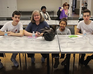 Neighbors | Abby Slanker.Lucy McHugh brought her family, from left, Kevin McHugh, Ava Hudak and Keith McHugh to the Canfield library movie matinee on Feb. 9.