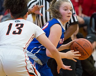 Western Reserve's Alyssa Serensky looks to pass the ball while Dalton's Jalyssa Turner tries to block her during their game at Perry High School in Massillon on Thursday evening. EMILY MATTHEWS | THE VINDICATOR