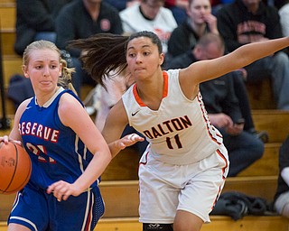 Western Reserve's Olivia Pater drives the ball while Dalton's Ellie Martinez tries to block her during their game at Perry High School in Massillon on Thursday evening. EMILY MATTHEWS | THE VINDICATOR