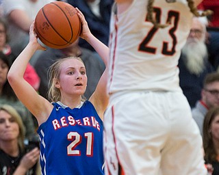 Western Reserve's Olivia Pater looks to pass the ball while Dalton's Camille Beatty tries to block her during their game at Perry High School in Massillon on Thursday evening. EMILY MATTHEWS | THE VINDICATOR