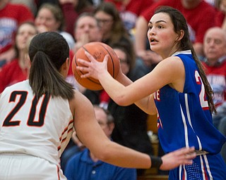 Western Reserve's Erica Dezee looks to pass the ball while Dalton's Makenna Geiser tries to block her during their game at Perry High School in Massillon on Thursday evening. EMILY MATTHEWS | THE VINDICATOR