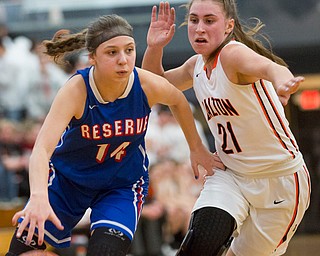 Western Reserve's Kennedy Miller drives the ball while Dalton's Kelsey Shoup tries to block her during their game at Perry High School in Massillon on Thursday evening. EMILY MATTHEWS | THE VINDICATOR