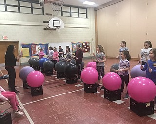 Neighbors | Jessica Harker.Stadium Drive Elementary School students gathered in the buildings gym to participate in the annual after school program Drums Alive with instructor Melony Anguili Feb. 26.