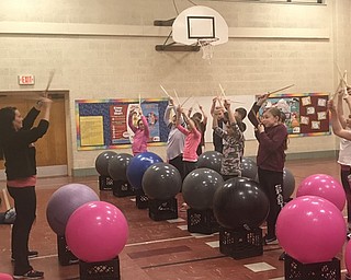 Neighbors | Jessica Harker.Instructor Melony Angiuli coached students during the Drums Alive after school program Feb. 26 at Boardman Stadium Drive Elementary School.