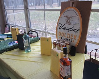 Neighbors | Jessica Harker .A variety of donated goods were available through the Chinese auction hosted by the Poland Rotary during the annual Golf Classic March 2.