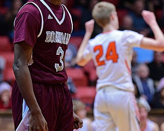 CANTON, OHIO - MARCH 7, 2019: Boardman's Derrick Anderson celebrates after being fouled by Green's Garrison Kesslar and making the basket during the first half of their OHSAA Tournament game, Thursday night at the Canton Civic Center. DAVID DERMER | THE VINDICATOR