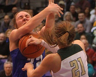 William D. Lewis The Vindicator  Poland's Morgan Kluchar(32) and SvSM'sMaria Dobson(21) battle for the ball.