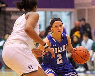 William D. Lewis The Vindicator  Poland's Sarah Bury(2) drives around Akromn SVSM Lanae Riley(34) Akron SVSM at Barberton 3-8-19.