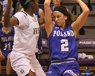 William D. Lewis The Vindicator  Poland's Sarah Bury(2) keeps the ball from Akron SVSM'sJada Haines(13) at Barberton 3-8-19.