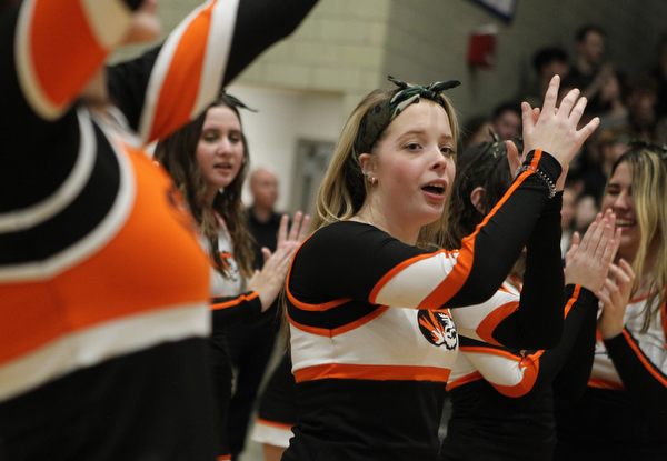 Springfield cheerleader Savannah Sheely celebrates as the Tigers take a lead late in the fourth quarter during Friday nights district championship game against Lowellville at Struthers High School.  Dustin Livesay  |  The Vindicator  3/8/19  Struthers