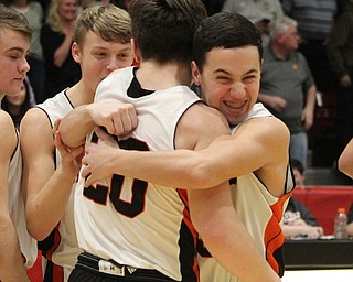 Lukas Yemma (3) of Springfield hugs Beau Brungard as time ran out during Friday nights district championship game at Struthers High School giving them the win over Lowellville.  Dustin Livesay  |  The Vindicator  3/8/19  Struthers