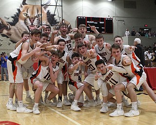 The Springfield Tigers pose for a picture after defeating Lowellville at Sturthers High School.  Dustin Livesay  |  The Vindicator  3/8/19  Struthers.