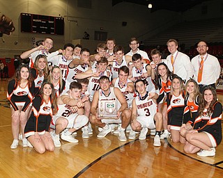 The Springfield Tigers pose for a picture with the Championship trophy after defeating Lowellville at Sturthers High School.  Dustin Livesay  |  The Vindicator  3/8/19  Struthers