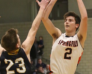 Springfield’s Drew Clark (2) puts up a 3-pointer over Lowellville’s Cole Bunofsky (23) during Friday nights district championship game at Struthers High School.  Dustin Livesay  |  The Vindicator  3/8/19  Struthers