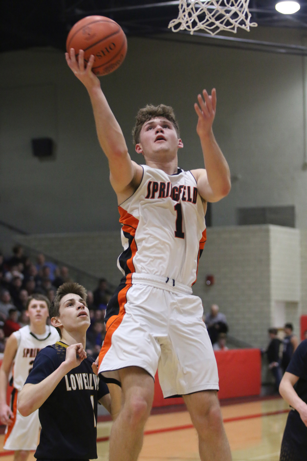 Evan Ohlin (1) of Springfield puts up a layup during Friday nights district championship game against Lowellville at Struthers High School.  Dustin Livesay  |  The Vindicator  3/8/19  Struthers