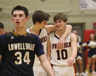 Sprinfields Drew Clark (2) and Clay Medvec (10) celebrate after Medvec drewa foul on Dylan Durkin of Lowellville late in the fourth quarter of Friday nights district championship game at Struthers High School.  Dustin Livesay  |  The Vindicator  3/8/19  Struthers