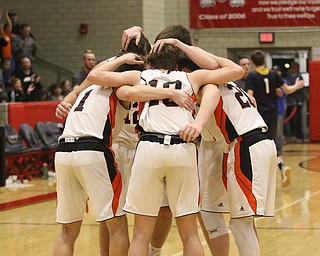 The Springfield starters huddle together as time runs out giving them the win in the District Championship game against Lowellville at Struthers High School on Friday night.  Dustin Livesay  |  The Vindicator  3/8/19  Struthers