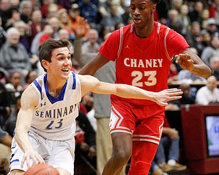 Poland's Michael Cougras drives the ball while Chaney's William Brown tries to block him during their game at Boardman High School on Saturday. EMILY MATTHEWS | THE VINDICATOR