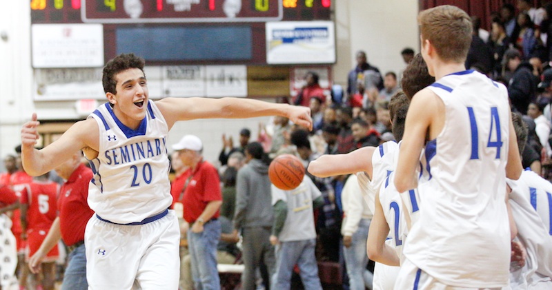 Poland’s Braeden O’Shaughnessy (3) looks to pass as Chaney’s Ryan Clark (4) defends during a Division II district final Saturday at Boardman High School. O’Shaughnessy scored 22 points in Poland’s 69-57 overtime victory.