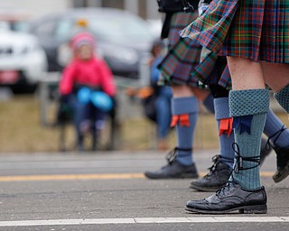 Members of the Macdonald Pipe Band of Pittsburgh march in the Mahoning Valley St. Patrick's Day Parade in Boardman on Sunday afternoon. EMILY MATTHEWS | THE VINDICATOR