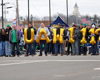 People with the UAW 1112 walk in the Mahoning Valley St. Patrick's Day Parade in Boardman on Sunday afternoon. EMILY MATTHEWS | THE VINDICATOR