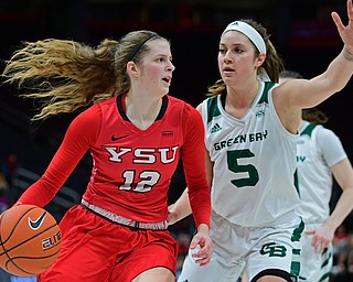 DETROIT, MICHIGAN - MARCH 11, 2019: Youngstown State's Chelsea Olson drives on Green Bay's Laken James during the first half of their Horizon League Tournament game, Monday afternoon at Little Caesars Arena. Green Bay won 55-53. DAVID DERMER | THE VINDICATOR