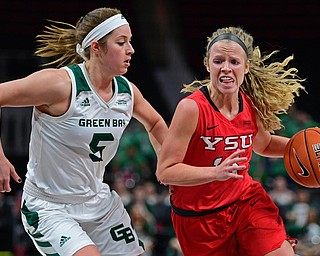 DETROIT, MICHIGAN - MARCH 11, 2019: Youngstown State's Melinda Trimmer drives on Green Bay's Laken James during the second half of their Horizon League Tournament game, Monday afternoon at Little Caesars Arena. Green Bay won 55-53. DAVID DERMER | THE VINDICATOR