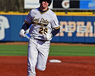 KENT, OHIO - MARCH 12, 2019: Kent State's Pavings Parks runs the bases after hitting a solo home run in the 3rd inning of their game, Tuesday afternoon at Kent State. Kent State won 10-5. DAVID DERMER | THE VINDICATOR