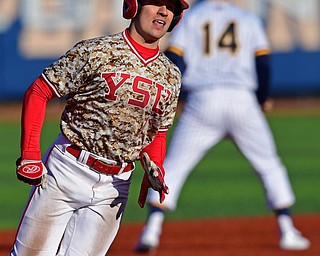 KENT, OHIO - MARCH 12, 2019: Youngstown State's Lucas Nasonti rounds third to score a run on a base hut by Blaze Glenn in the 5th inning of their game, Tuesday afternoon at Kent State. Kent State won 10-5. DAVID DERMER | THE VINDICATOR