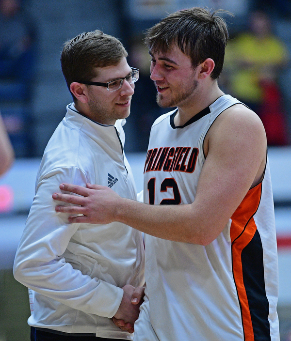 CANTON, OHIO - MARCH 12, 2019: Springfield's Shane Eynon is congratulated by head coach Steve French after being removed from the game during the second half of their game, Tuesday night at the Canton Fieldhouse. DAVID DERMER | THE VINDICATOR