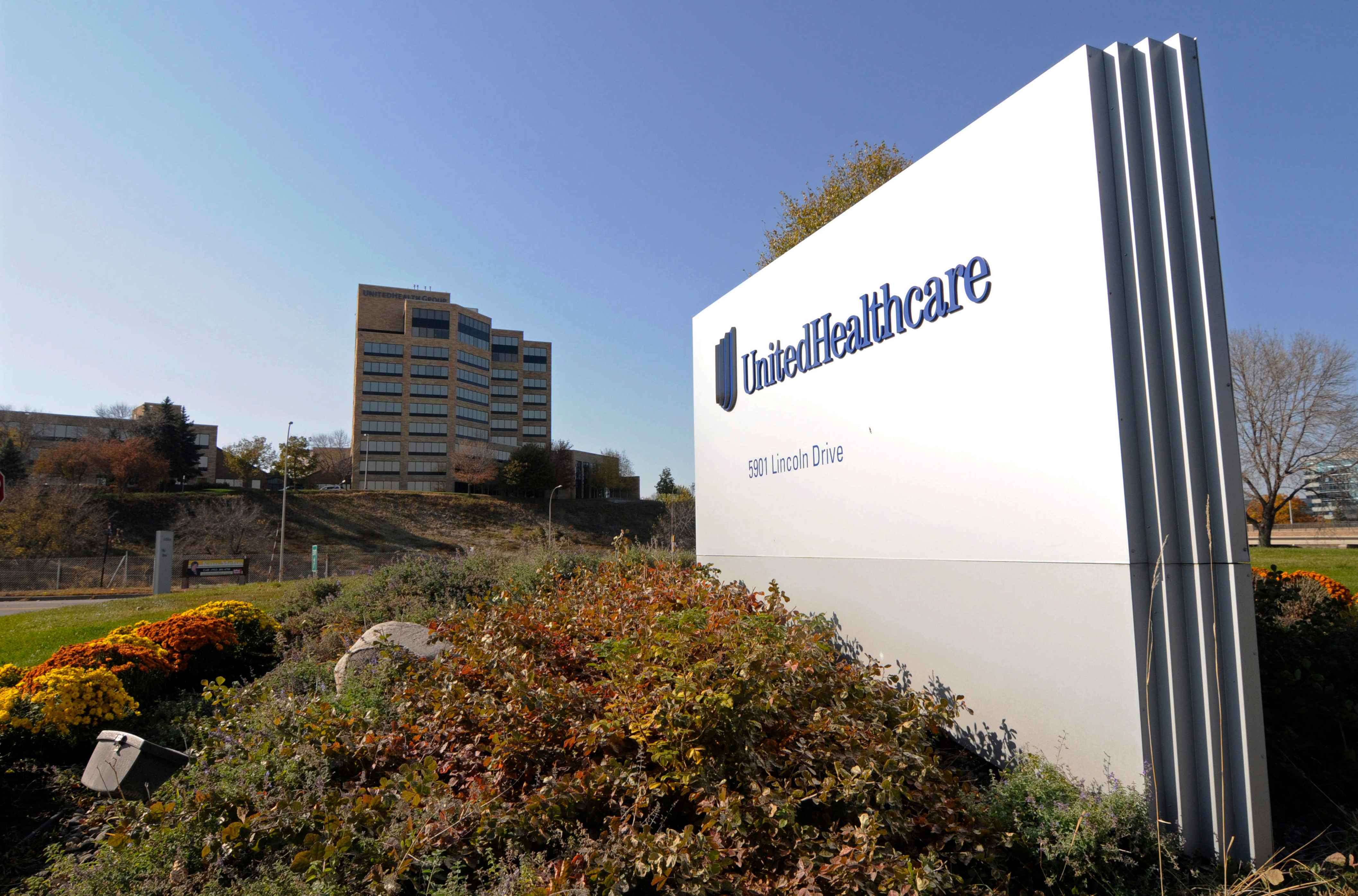 This Oct. 16, 2012, file photo shows a portion of the UnitedHealth Group Inc.'s campus in Minnetonka, Minn. The nation's biggest health insurer is expanding a program that passes rebates from drugmakers directly to the people that use their medications. UnitedHealthcare said Tuesday, March 12, 2019, that next year, all of its new, employer-sponsored health care plans must give point-of-sale discounts to consumers when they pick up medications.