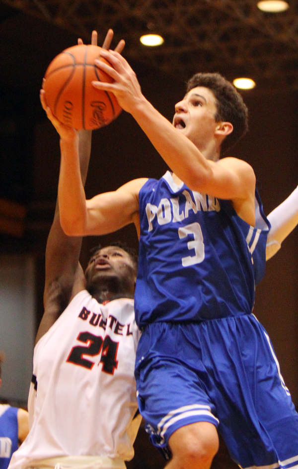 William D. Lewis The Vindicator   Poland's Braeden O'Shaughnessy(3) shoots past Buchtels Chris Livingston 24