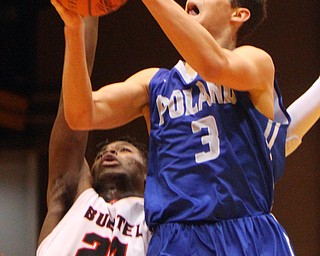 William D. Lewis The Vindicator   Poland's Braeden O'Shaughnessy(3) shoots past Buchtels Chris Livingston 24