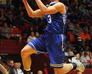 William D. Lewis The Vindicator Poland's Braeden O'Shaughnessy (3) shoots.