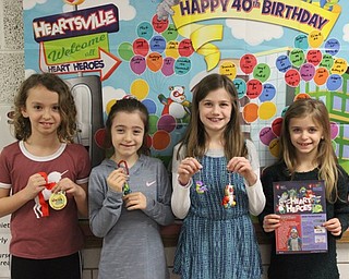 Neighbors | Abby Slanker.Students at C.H. Campbell Elementary School raised money for the school’s annual American Heart Association Kids Heart Challenge. Pictured are four of the top money raisers in the school.