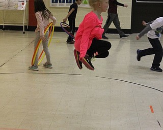 Neighbors | Abby Slanker.A first-grade Hilltop Elementary School student jumped high into the air while long rope jumping at the school’s annual American Heart Association Kids Heart Challenge on Feb. 6.