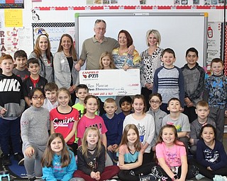 Neighbors | Abby Slanker.Canfield PTA’s Crazy Cash Giveaway winner Ellen Monroe was joined by her husband Russ, daughter Mena, Canfield PTA president Julie Miller, first vice president overseeing fund raising for the Canfield PTA Noelle Domer, C.H. Campbell Elementary School third-grade teacher Kara Mikolich and Mena’s classmates as she celebrated winning $10,000 on March 5.