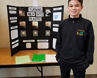 Neighbors | Submitted.Christopher Philibin was named Best of Show at the Holy Family Science Fair with his project Turning Milk Into Plastic..