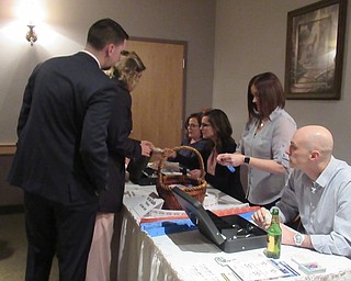 Neighbors | Jessica Harker.Boardman community members bought tickets for the reverse raffle at the annual Boardman School Fund for Educational Excellence fundraiser March 8 at Avion banquet center.
