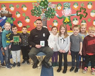 Neighbors | Submitted.Poland Union preschool students were visited by school resource officer Matthew Martinez to help them celebrate St. Patricks day.