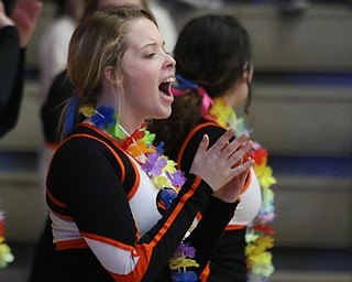 Springfield cheerleader Savannah Sheely celebrates late in the fourth quarter during the second half of Friday night's Regional Championship matchup against Richmond at the Canton Fieldhouse.  Dustin Livesay   |   The Vindicator  3/15/19  Canton..